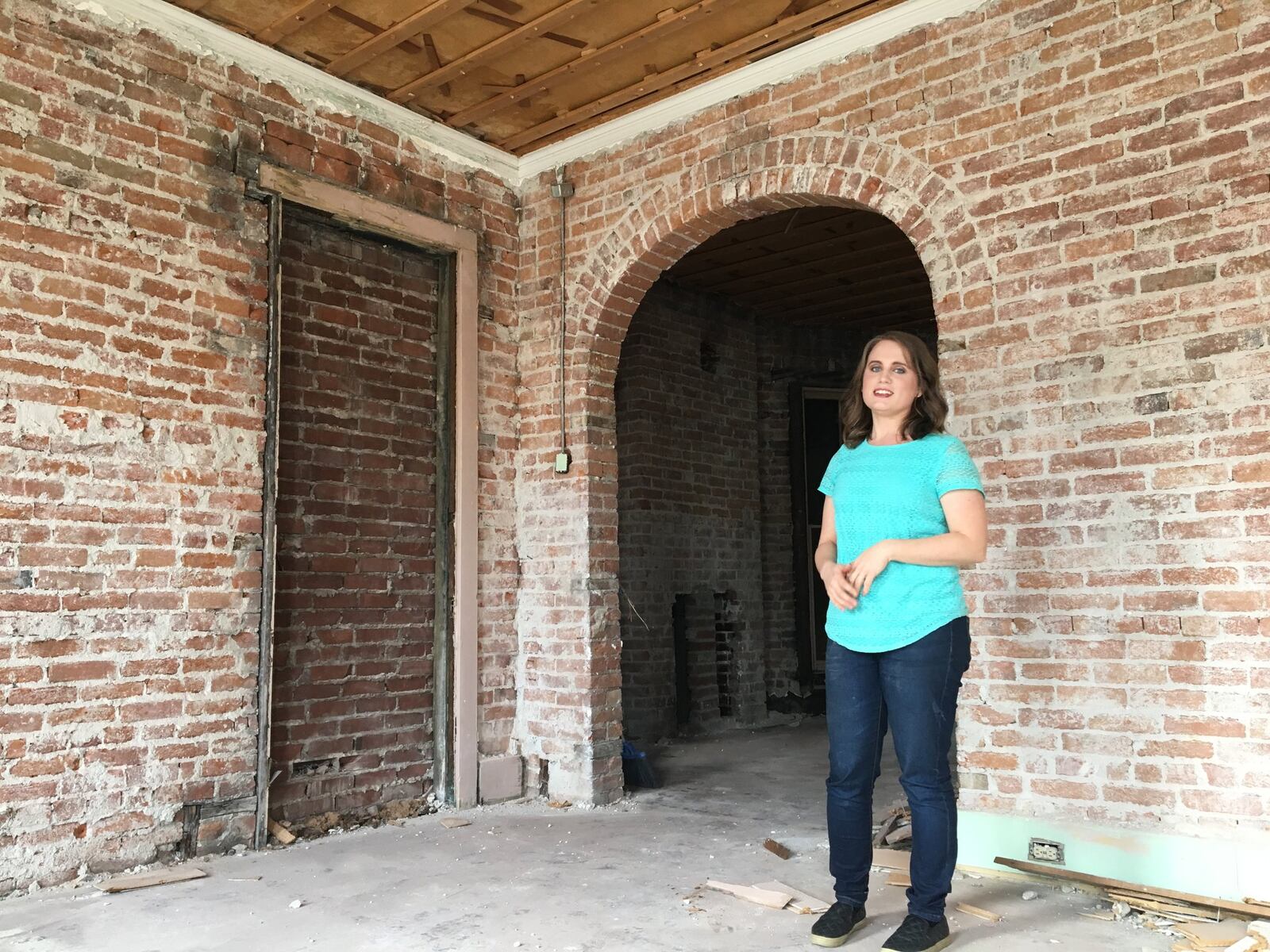 Ashlee Haselby is working to renovate a former funeral home on the 1800 block of East Third St. She plans to open an antiques mall and coffee shop in the space, which is spread across three interconnected buildings. CORNELIUS FROLIK / STAFF