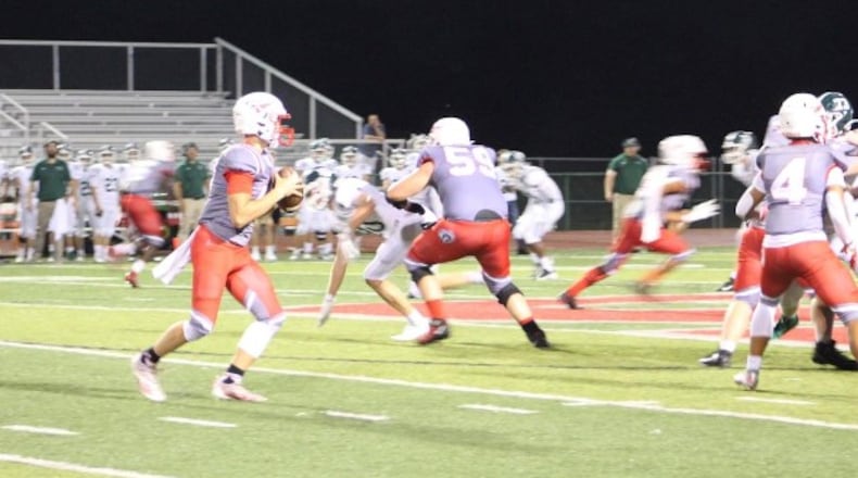 Stebbins quarterback Nate Keller looks for a receiver during a game earlier this season. CONTRIBUTED