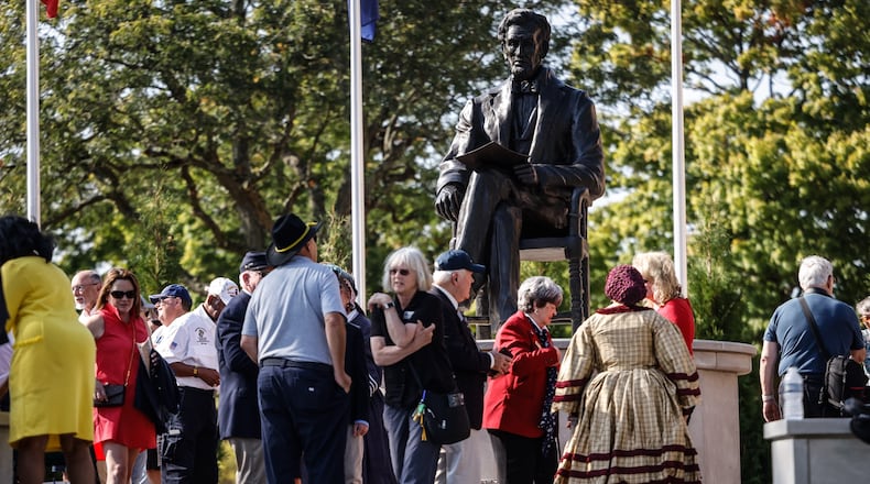Hundreds of people watched the unveiling of the Lincoln statue at the Dayton VA Medical Center Monday September 16, 2024. Jim Noelker/Staff