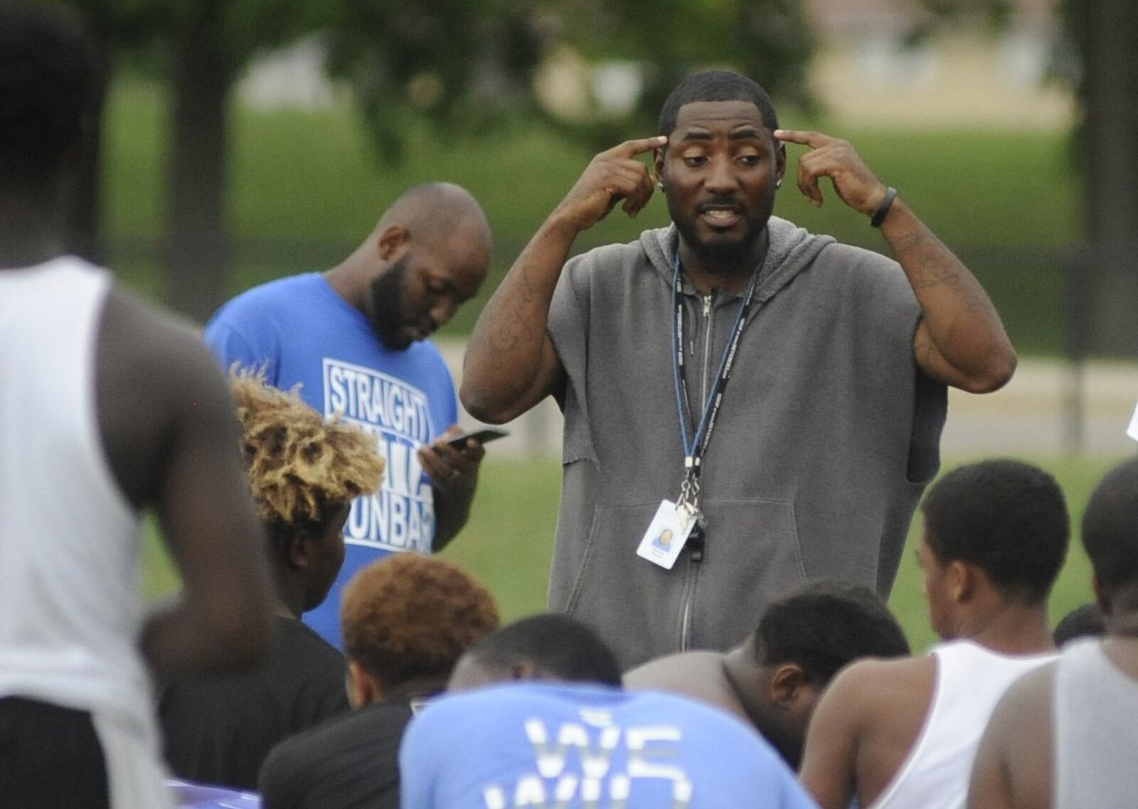 Dunbar head football coach Darran Powell (center) said he was told by Dayton Public Schools athletic director Mark Baker to lose to Belmont. MARC PENDLETON / STAFF