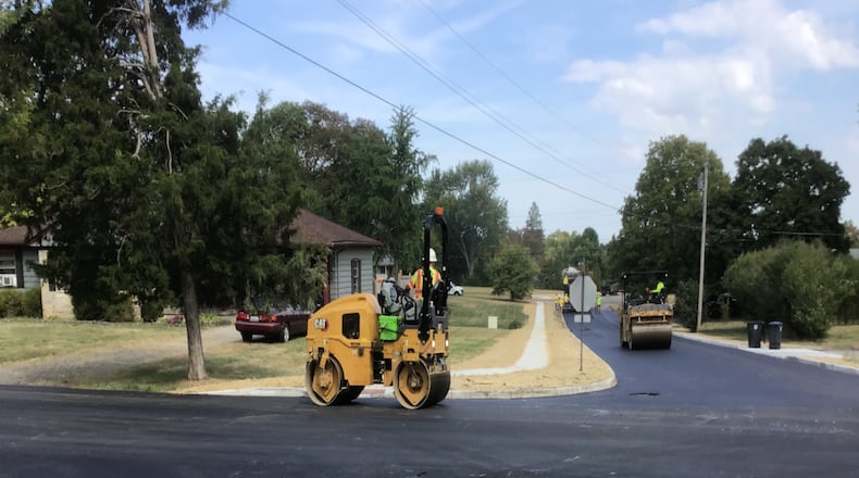 Crew works to complete the Hampton Roadway Improvement Project this summer. The nearly $274,000 project widened the road, adding curbs, catch basins and a connecting sidewalk. CONTRIBUTED
