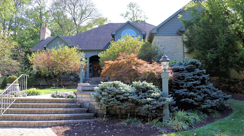 In Kettering, this custom-built, two-story house offers about 7,942 of living space and is listed for $969,000. Contributed photos
