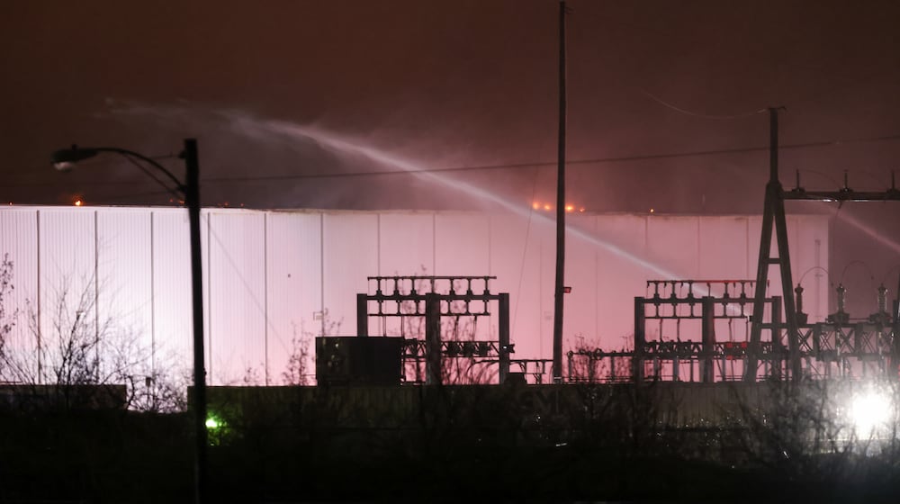 Area firefighters worked to pour water on flames at the Fuyao Glass America plant fire Sunday, March 22, 2026 in Moraine. Bryant Billing / Staff
