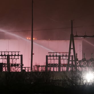 Area firefighters worked to pour water on flames at the Fuyao Glass America plant fire Sunday, March 22, 2026 in Moraine. Bryant Billing / Staff