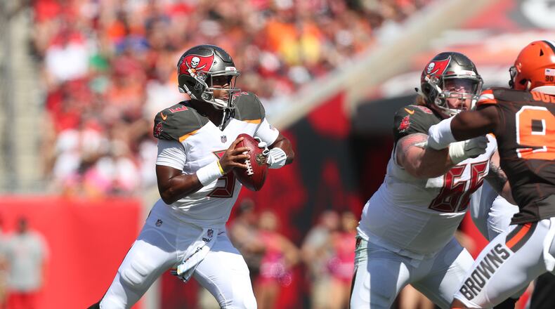Tampa Bay Buccaneers quarterback Jameis Winston (3) scrambles in the pocket to find an open receiver during the first quarter against the Cleveland Browns on Sunday, Oct. 21, 2018 at Raymond James Stadium in Tampa, Fla. (Monica Herndon/Tampa Bay Times/TNS)