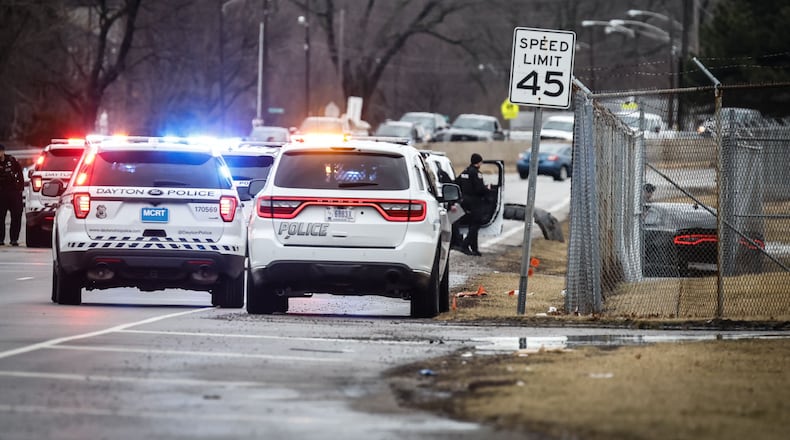 Police activity on Woodman Avenue near Airway Road | JIM NOELKER