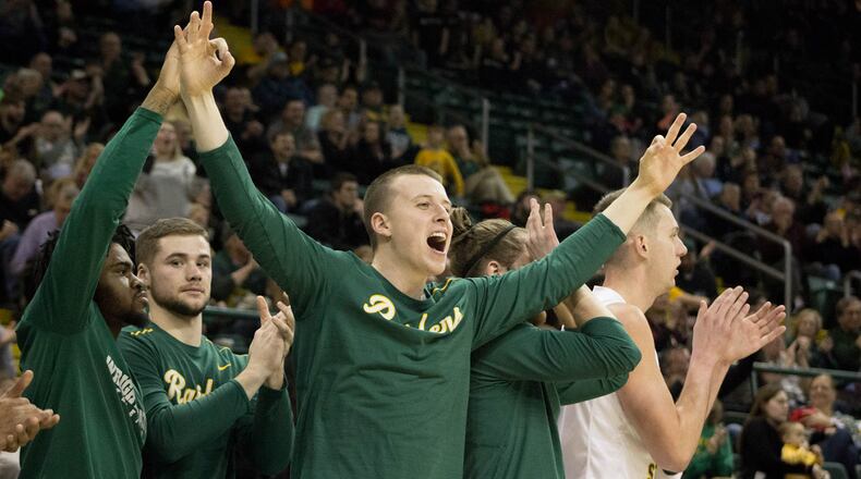 The Wright State bench reacts to a Grant Benzinger 3-pointer during Thursday night’s win against Green Bay. ALLISON RODRIGUEZ/CONTRIBUTED PHOTO