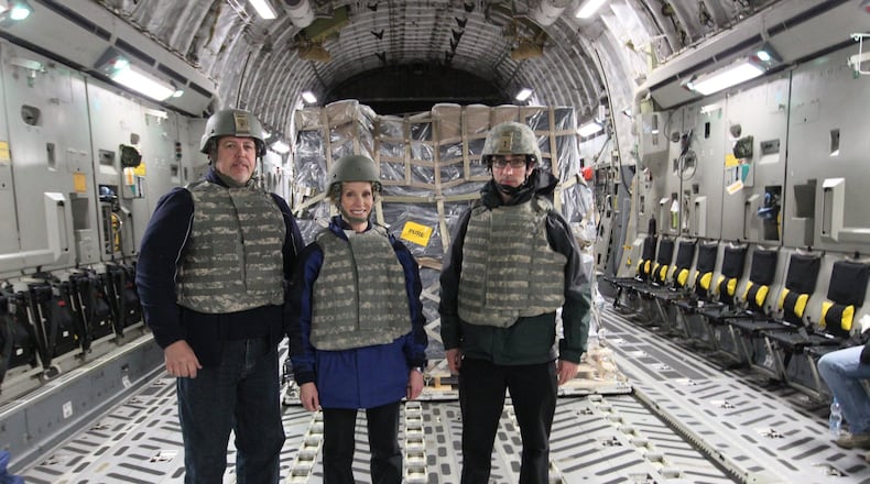 Dayton Daily News reporter Barrie Barber (right), Newscenter 7 anchor Cheryl McHenry and Newscenter 7 videographer Bob Garlock went on a 12,000-mile journey with a crew from the 445 Airlift Wing at Wright-Patterson Air Force Base recently from the base, to Maryland, Germany and Afghanistan.
