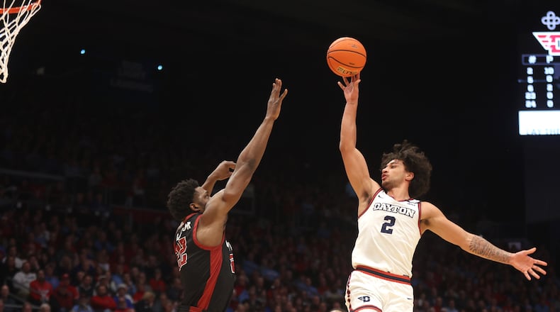 Dayton's Nate Santos scores against Saint Joseph’s on Friday, Jan. 24, 2025, at UD Arena. David Jablonski/Staff