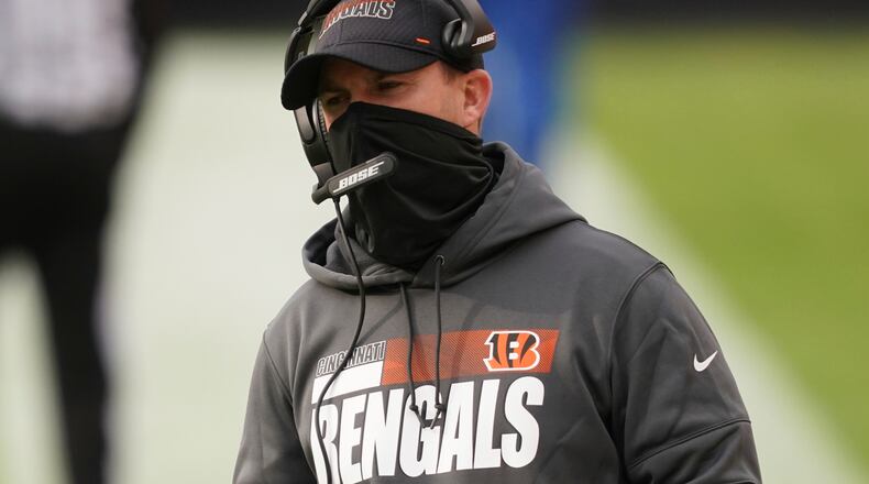 Cincinnati Bengals head coach Zac Taylor is shown during the first half of an NFL football game against the Washington Football Team, Sunday, Nov. 22, 2020, in Landover, Md. The Miami Dolphins play against the Cincinnati Bengals on Sunday, Dec. 6.(AP Photo/Andrew Harnik)