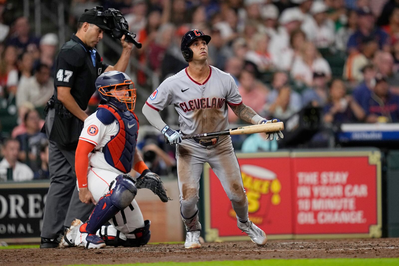 Cleveland Guardians' Brayan Rocchio, right, watches his home run along with Houston Astros catcher Yainer Diaz during the fourth inning of a baseball game Tuesday, July 8, 2025, in Houston. (AP Photo/David J. Phillip)