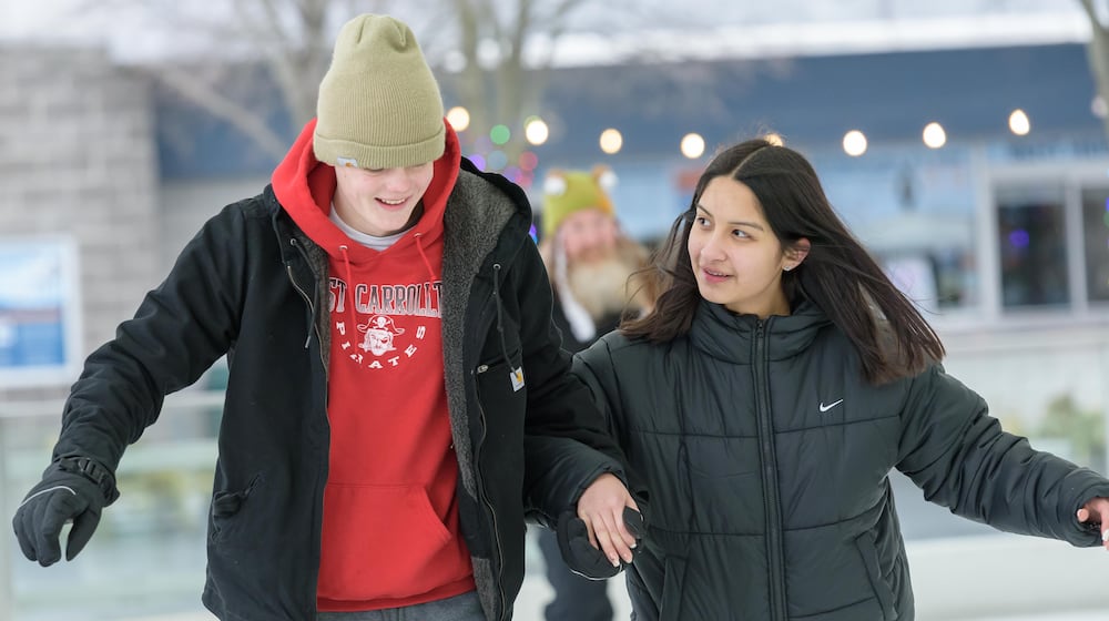 Five Rivers MetroParks hosted the Timeless Tales Family Skate Day at the MetroParks Ice Rink, located at RiverScape MetroPark in downtown Dayton on Sunday, Jan. 11, 2026. The Penguin Toss, family-friendly music plus games, coloring pages and a scavenger hunt in the heated comfort tent are featured during this weekly event. The ice rink is open daily until Feb. 27 (weather permitting). TOM GILLIAM / CONTRIBUTING PHOTOGRAPHER