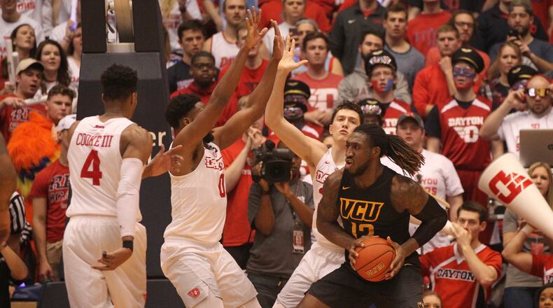 Virginia Commonwealth’s Mo Alie-Cox looks for a shot against Dayton on March 1, 2017, at UD Arena. David Jablonski/Staff