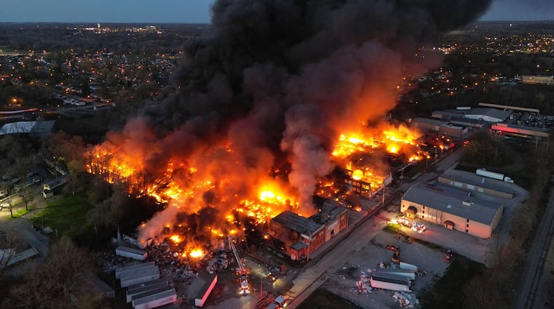 A plume of thick, black smoke traveled for miles that was coming from the massive and toxic industrial fire Tuesday, April 11, 2023, at a recycling facility in Richmond, Indiana. NICK GRAHAM/STAFF