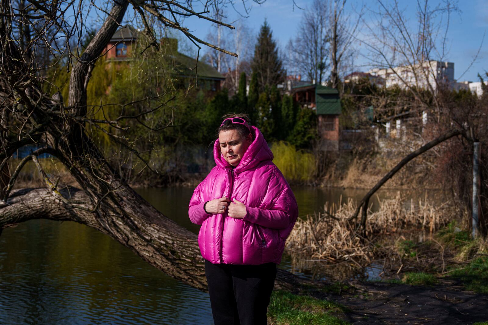 Olena Tsyhipa walks near a lake in Kyiv, Ukraine, on April 3, 2025. Her husband, journalist and activist Serhii Tsyhipa, was imprisoned by the Russians in the early days of the war in Ukraine in 2022. (AP Photo/Evgeniy Maloletka)