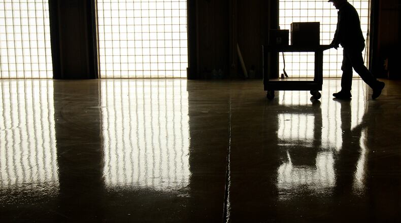Bullen Ultrasonics said it has been certified in the aerospace industry’s AS9100 standard. In this 2013 file photo, Rick Springer moves product in the shipping department at Bullen. JIM WITMER / STAFF