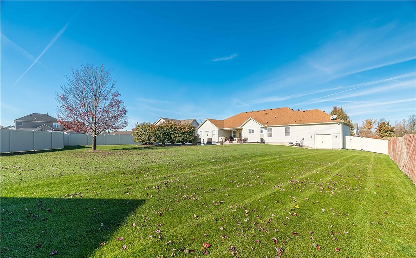 The backyard is fully fenced and there is a covered patio with a ceiling fan. Concrete extends to surround the in ground pool. CONTRIBUTED