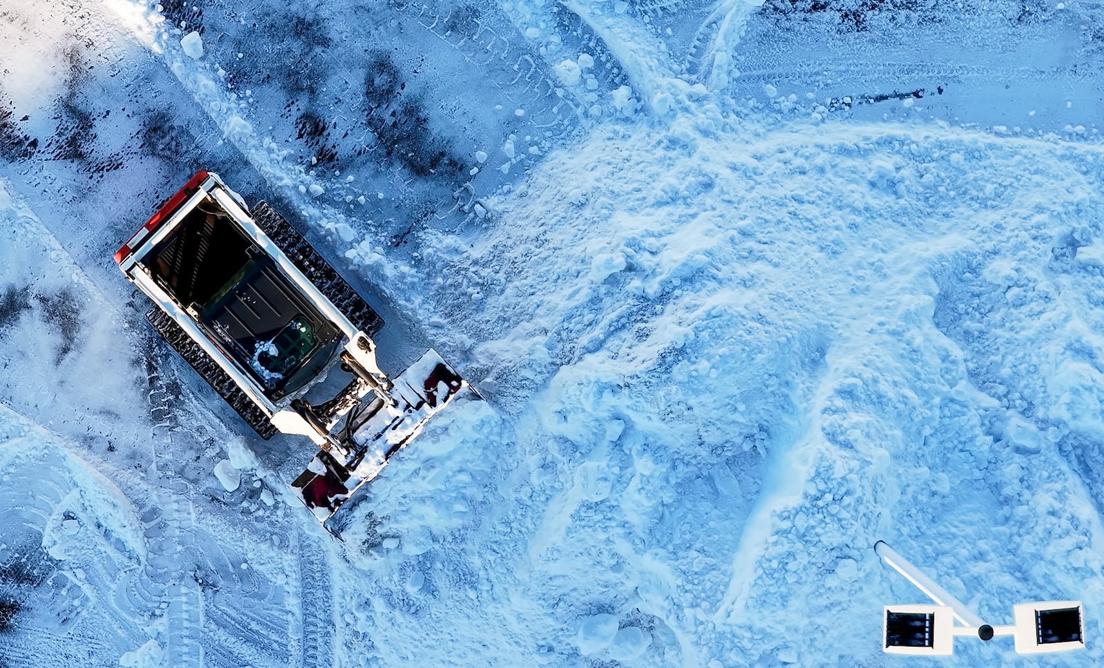 Crews clean up the lot at Matt Castrucci Auto Mall near the Dayton Mall on Monday, Jan. 26, 2026. NICK GRAHAM / STAFF