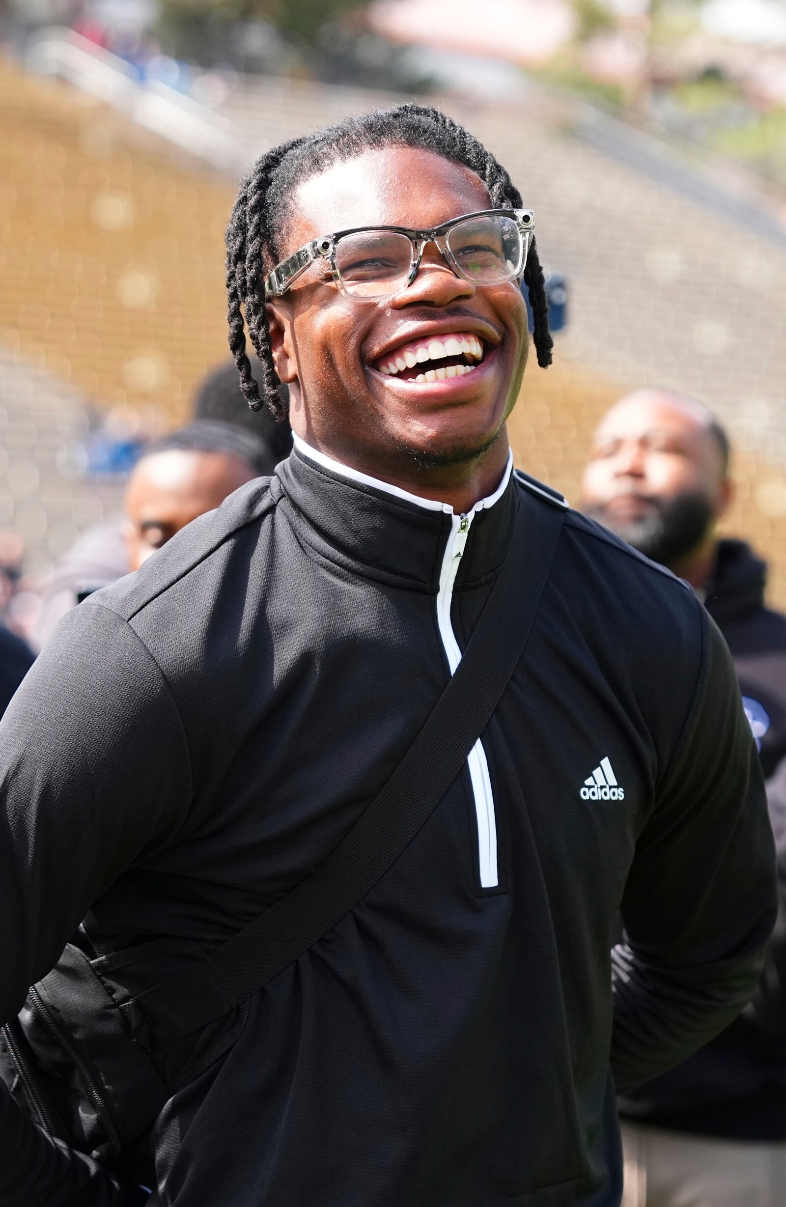 Travis Hunter reacts to his jersey retirement during Colorado's NCAA college football spring game, Saturday, April 19, 2025, in Boulder, Colo. (AP Photo/Jack Dempsey)