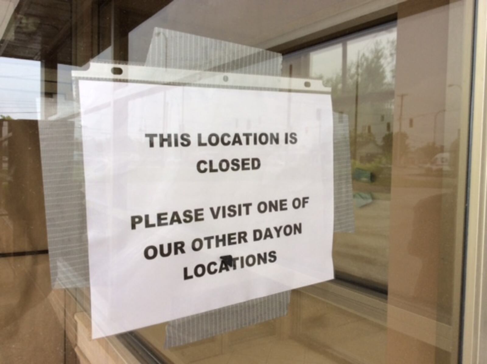 Customers of the Tim Horton’s on Ohio 725 in Washington Twp. encountered this sign and locked doors this week. MARK FISHER/STAFF