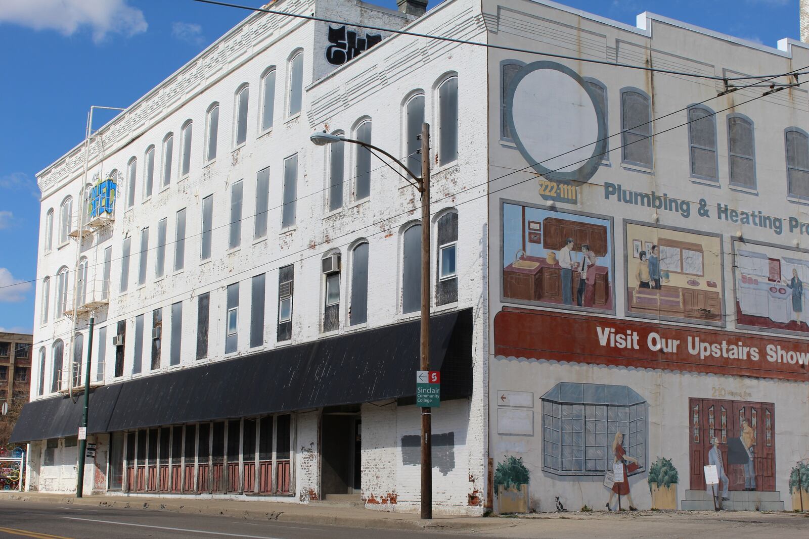 The empty industrial building at 210 Wayne Ave. is being turned into 40-style loft apartments, and a restaurant is moving into a ground floor space. CORNELIUS FROLIK / STAFF