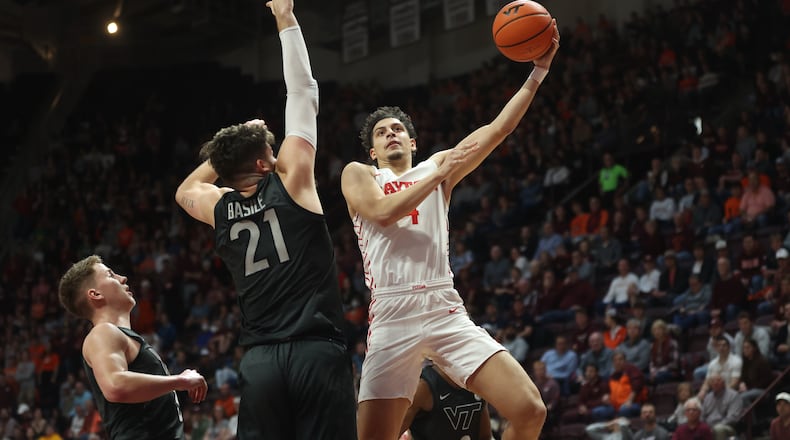 Dayton's Koby Brea shoots against Virginia Tech on Wednesday, Dec. 7, 2022, at Cassell Coliseum in Blacksburg, Va. David Jablonski/Staff