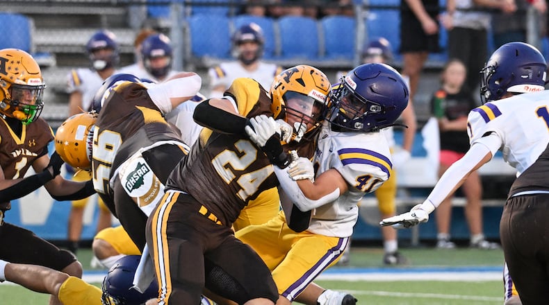 Alter High School senior Noah Jones collides with Bellbrook sophomore Jayce Spencer during their game on Friday, Sept. 19 at Miamisburg High School's Holland. The Knights won 21-3.  NICK FALZERANO / CONTRIBUTED PHOTO