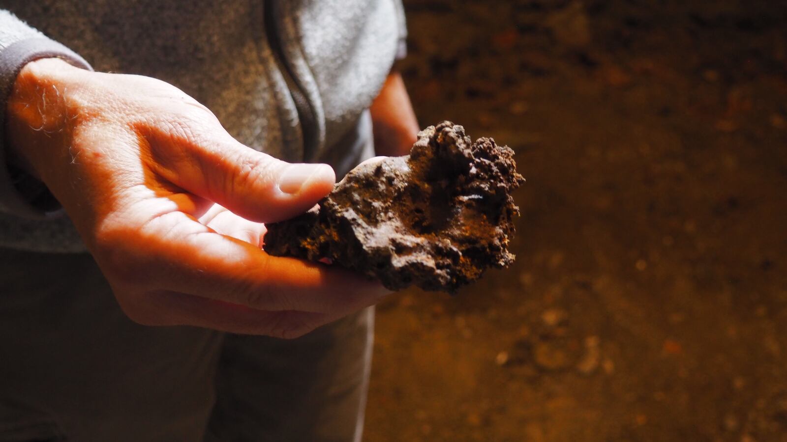 A piece of burnt debris that Lehman believes is from the 1870s fire that destroyed the Augspurger structure. BRYN DIPPOLD/STAFF