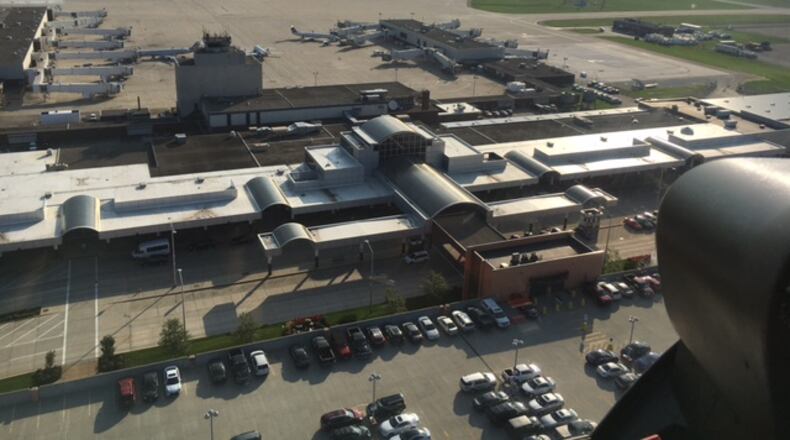 A view of the Dayton International Airport terminal, with runways behind, from a helicopter flight in August 2016. THOMAS GNAU/STAFF