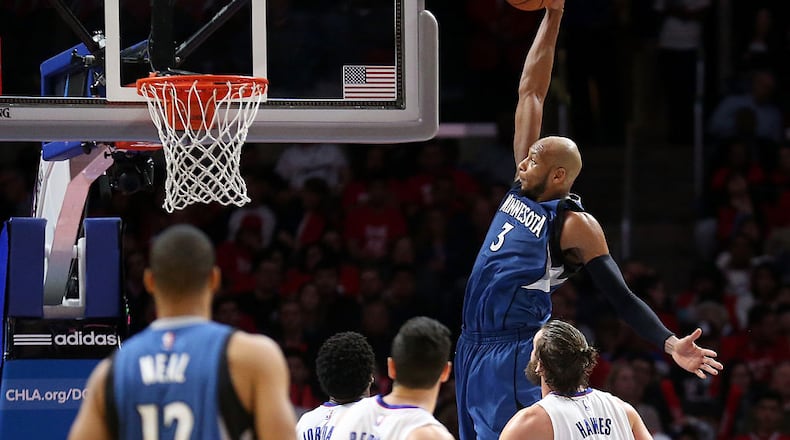 LOS ANGELES, CA - MARCH 09: Adreian Payne #3 of the Minnesota Timberwolves dunks against the Los Angeles Clippers at Staples Center on March 9, 2015 in Los Angeles, California. The Clippers won 89-76. NOTE TO USER: User expressly acknowledges and agrees that, by downloading and or using this photograph, User is consenting to the terms and conditions of the Getty Images License Agreement. (Photo by Stephen Dunn/Getty Images)