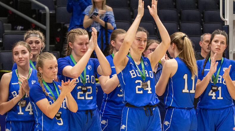 Springboro players clap for head coach Mike Holweger as he is presented with his medal after the Panthers lost to Olmsted Falls in the Division I state final Saturday night at UD Arena. Jeff Gilbert/CONTRIBUTED