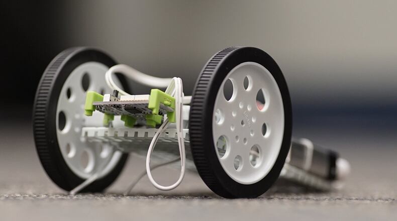 Toys based in science, technology, engineering and math are not only more commonplace, making educational and fun holiday gifts, they can even inspire a lifelong career, according to experts. Robotic toys such as this can introduce kids to industry concepts and are even loaned free of charge to local educators through the Wright-Patterson Educational Outreach “WOW! on Wheels” program. (U.S. Air Force photo/Kwame Acheampong)