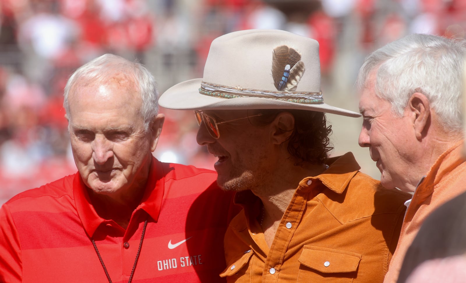 Former Ohio State coach John Cooper poses for a photo with Texas fan Matthew McConaughey on Saturday, Aug. 30, 2025, at Ohio Stadium in Columbus. David Jablonski/Staff