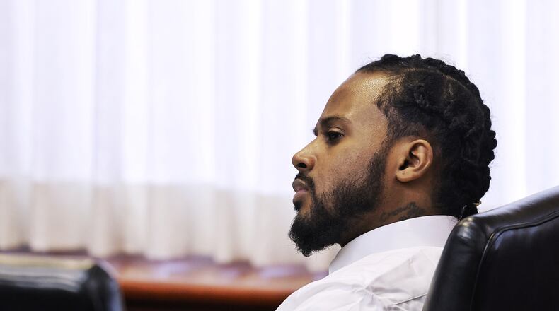 Marquan Cook sits for his trial Tuesday, Dec. 14, 2021 in Butler County Common Pleas Court charged in the shooting death of Brandon Frank Nathanial Moneyham Sr. In 2020 in a parking lot outside the 513 Lounge on Verity Parkway. NICK GRAHAM / STAFF