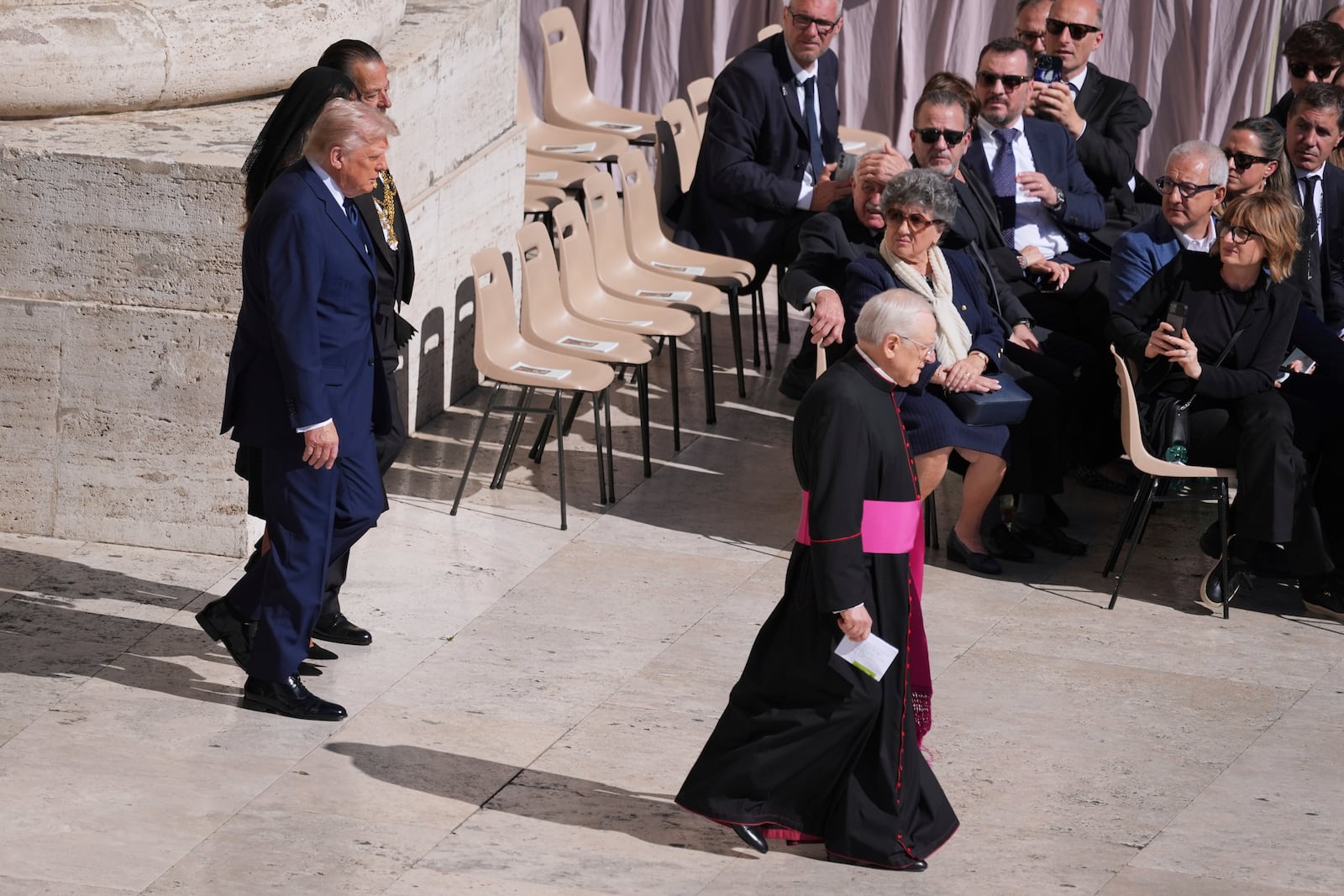 President Donald Trump and first lady Melania Trump, arrive for the funeral of Pope Francis in St. Peter's Square at the Vatican, Saturday, April 26, 2025. (AP Photo/Evan Vucci)