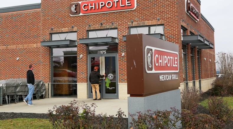Chipotle Mexican Grill in Monroe, Ohio, GREG LYNCH / STAFF Customers visit the Chipotle Mexican Grill in Monroe during the lunch time rush, Thursday, Dec. 10, 2015. Unconfirmed cases of E. Coli have been reported at Chipolte locations in Ohio and other states. GREG LYNCH / STAFF