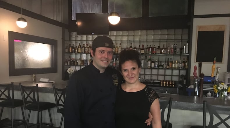 Jack and Natalie Skilliter pictured in front of the bar at their Oregon District restaurant, Corner Kitchen. CONTRIBUTED