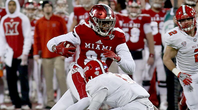 Contributed photo by E.L. Hubbard Miami RedHawk wide receiver James Gardner tries to get past Ball State safety Corey Hall during their MAC contest at Yager Stadium in Oxford Tuesday, Nov. 22, 2016.