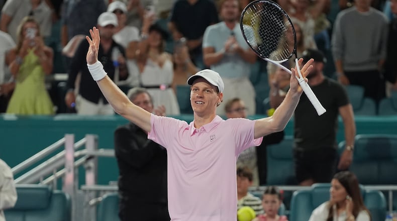 Jannik Sinner of Italy reacts after defeating Alexander Zverev of Germany during a semifinal match at the Miami Open tennis tournament, Friday, March 27, 2026, in Miami Gardens, Fla. (AP Photo/Marta Lavandier)