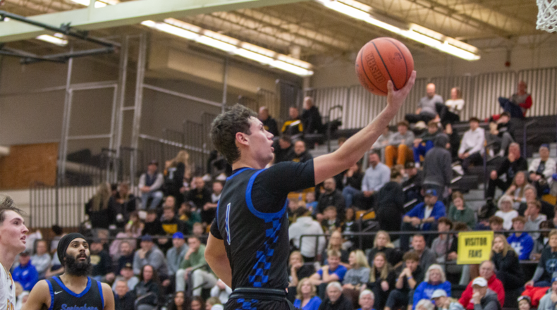 Springboro senior Brayden Wilhite goes to the basket during Tuesday night's 51-41 loss at Centerville. Jeff Gilbert/CONTRIBUTED