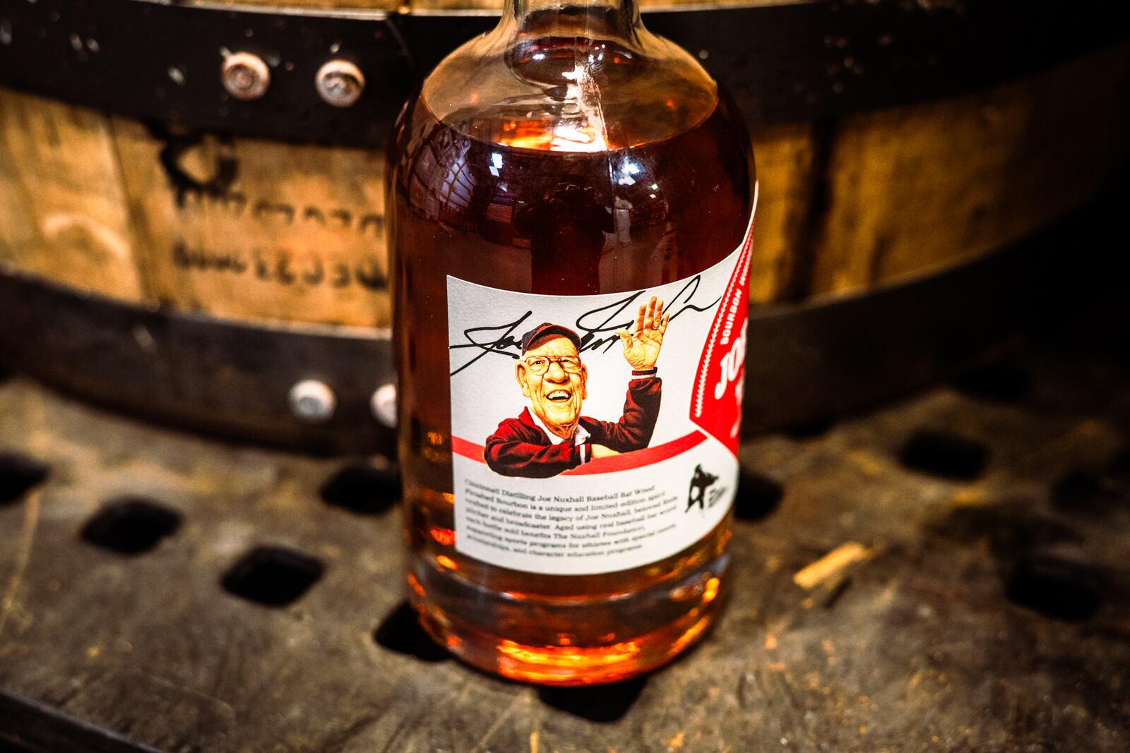 Cincinnati Distilling is launching next week the Joe Nuxhall Baseball Bat Aged Bourbon in collaboration with The Nuxhall Foundation. The limited edition 90-proof bourbon features an award-winning recipe that honors the Ol’ Lefthander, a Cincinnati Reds Hall of Fame pitcher and native Hamiltonian. The bourbon is available for pre-order and will be released on April 12, 2025, at a special event in downtown Cincinnati. PROVIDED