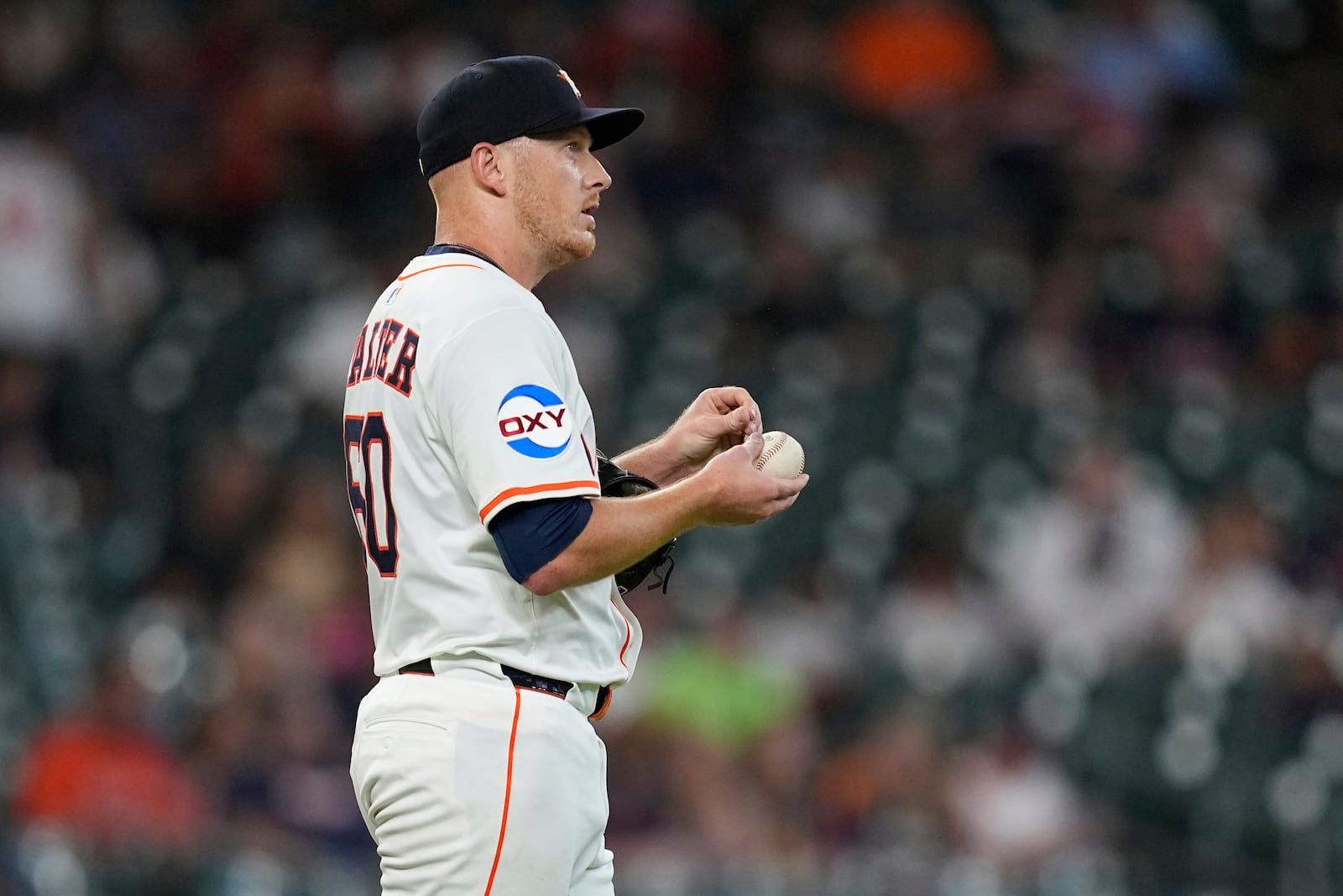 Houston Astros starting pitcher Brandon Walter looks the outfield after giving up a home run to Cleveland Guardians' José Ramírez during the first inning of a baseball game Wednesday, July 9, 2025, in Houston. (AP Photo/David J. Phillip)