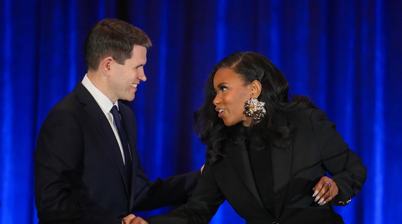 Texas state Rep. James Talarico, D-Austin, left, shakes hands with Rep. Jasmine Crockett, D-Texas, prior a debate during the Texas AFL-CIO Committee on Political Education Convention, Saturday, Jan. 24, 2026, in Georgetown, Texas. (Bob Daemmrich/Texas Tribune via AP, Pool)