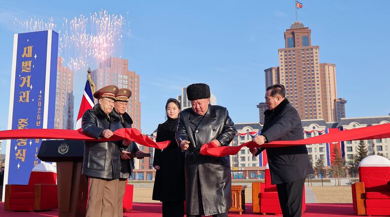 In this photo provided by the North Korean government, North Korean leader Kim Jong Un, second right, attends a completion ceremony of the new street, called Saeppyol Street in Pyongyang, North Korea Sunday, Feb. 15, 2026. Independent journalists were not given access to cover the event depicted in this image distributed by the North Korean government. The content of this image is as provided and cannot be independently verified. Korean language watermark on image as provided by source reads: "KCNA" which is the abbreviation for Korean Central News Agency. (Korean Central News Agency/Korea News Service via AP)