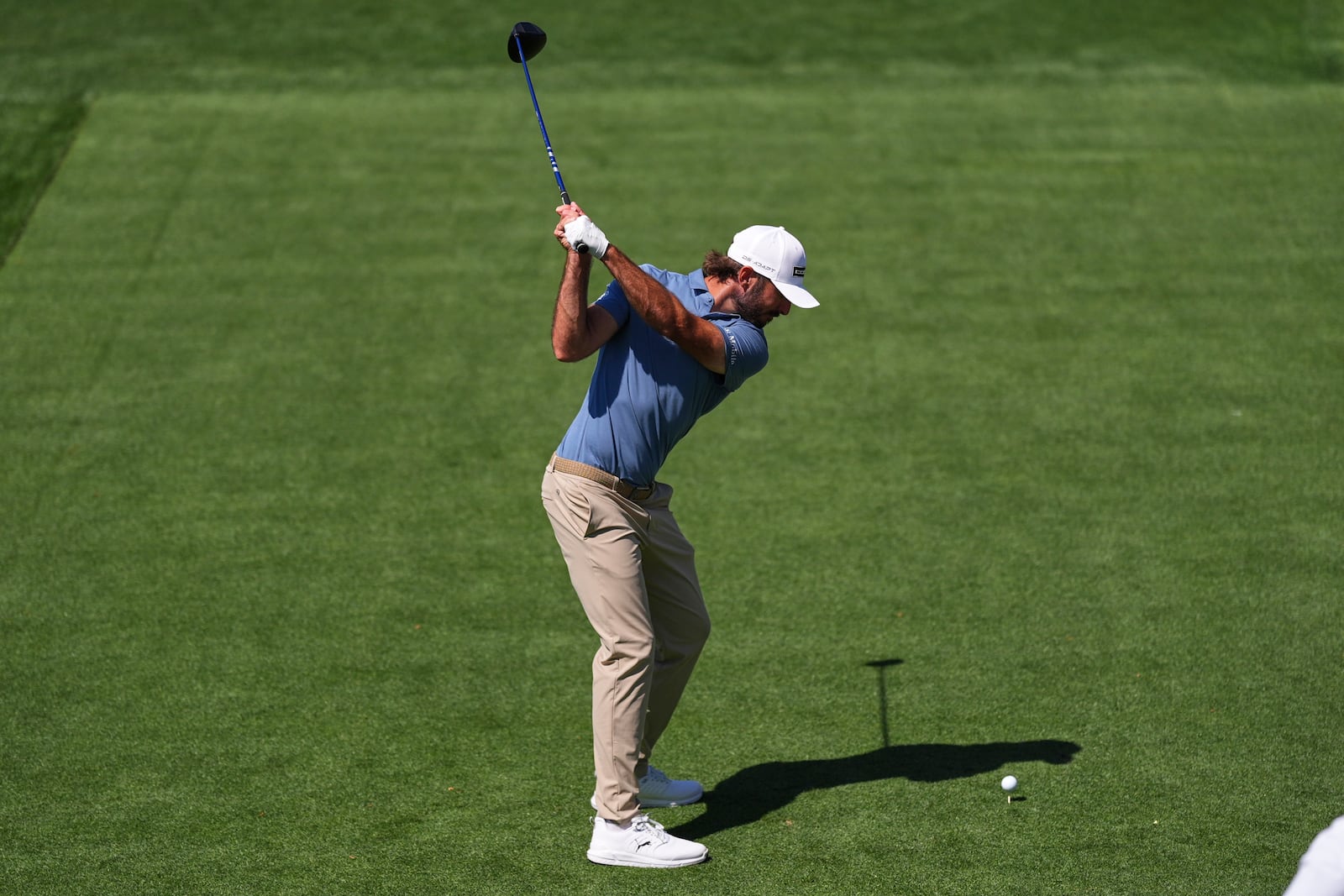 Max Homa hits from the 18th tee during a practice round at the Masters golf tournament, Tuesday, April 8, 2025, in Augusta, Ga. (AP Photo/Matt Slocum)