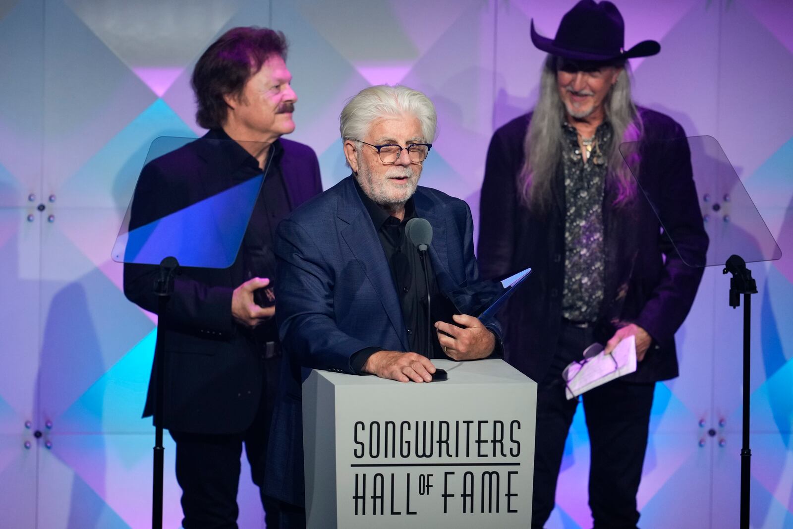 Tom Johnston, from left, Michael McDonald, and Patrick Simmons of The Doobie Brothers accept an award during the 54th annual Songwriters Hall of Fame induction and awards gala on Thursday, June 12, 2025, at the Marriott Marquis Hotel in New York. (Photo by Charles Sykes/Invision/AP)