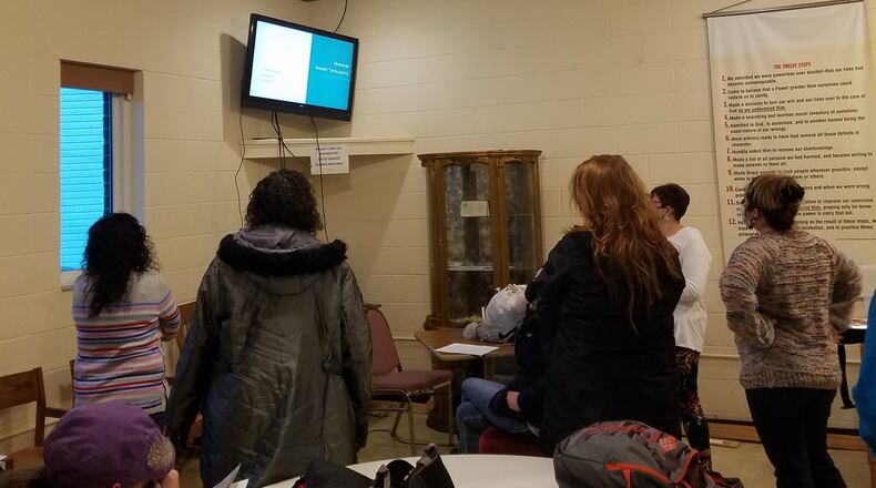 Oasis House members learn about handling emotions during a session called “Chicken Soup for the Mind, Body and Spirit”