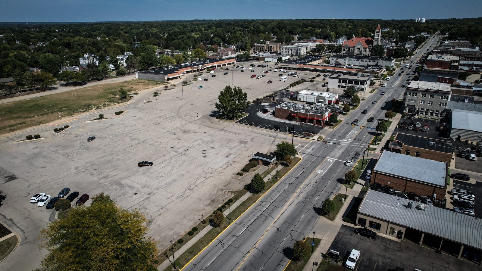 This is an aerial of Xenia Town Square in September 2023. The photograph is looking east with the center of downtown in the background. The Ramada Inn is just off the bottom left corner of the photo. JIM NOELKER/STAFF