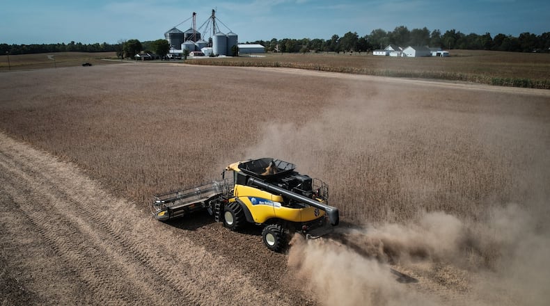 A farmer harvest soybeans in Western Montgomery County Wednesday September  20, 2023. Jim Noelker/Staff