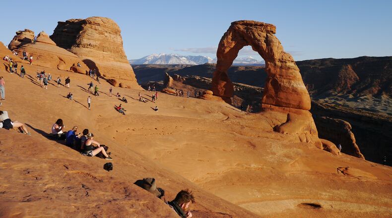 Delicate Arch in Arches National Park is a popular place to watch the sun go down. (Neil Ballentine/Chicago Tribune/TNS)